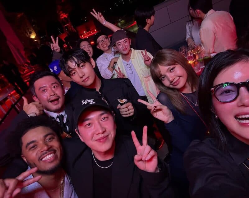 V Steals the Show With Quirky Kimbap Moment Beside Lisa at Paradise Art Night
