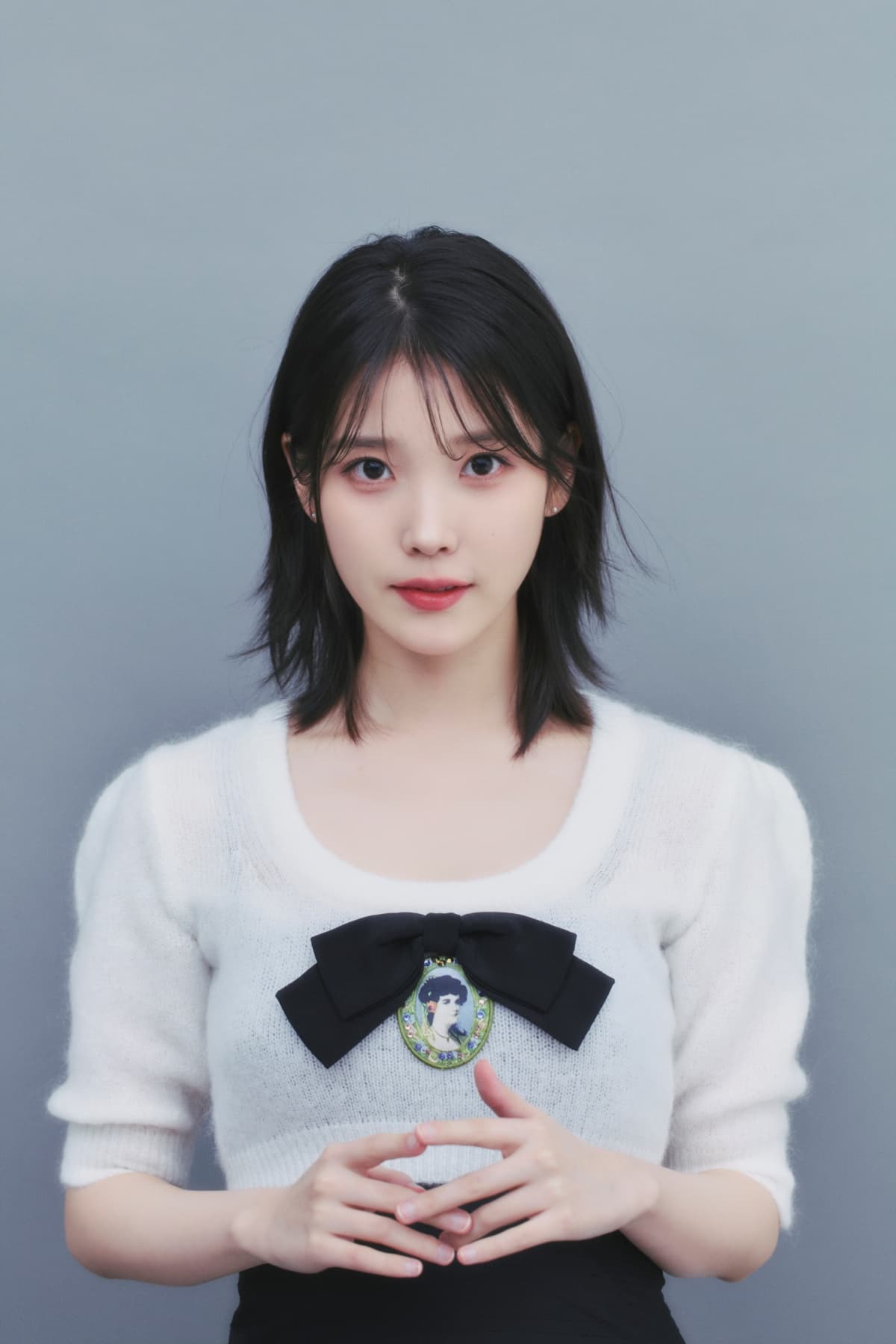 IU Celebrates Her 15th Anniversary with a Generous 300 Million KRW Donation